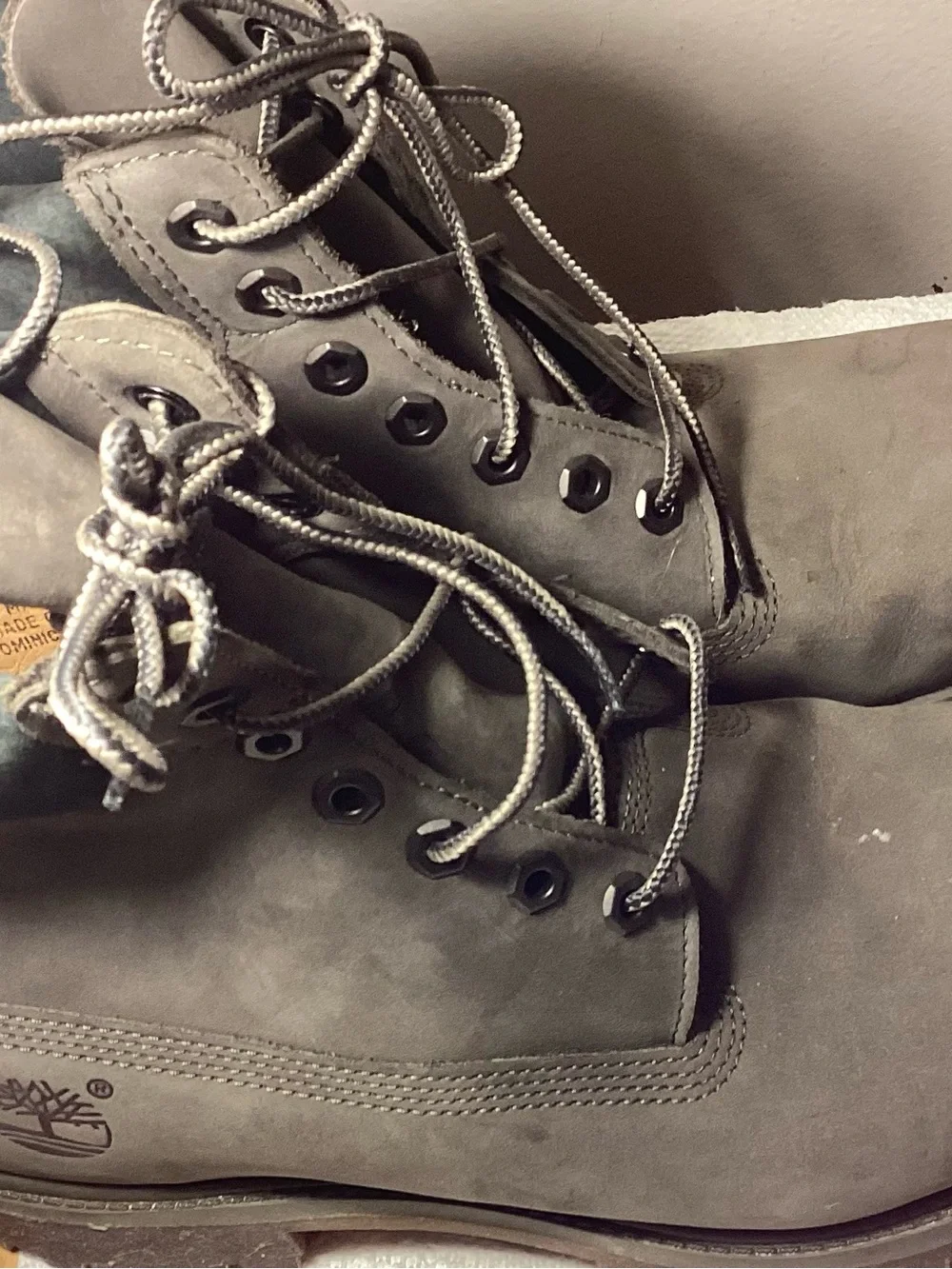 Timberland boots Grey size 9.5 shows marks wear tear bottoms barely used